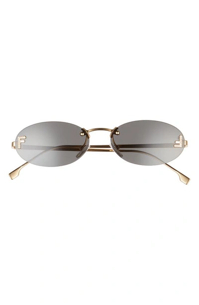 Fendi 54mm Oval Sunglasses In Shiny Endura Gold / Smoke