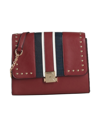 Rodier Handbags In Red