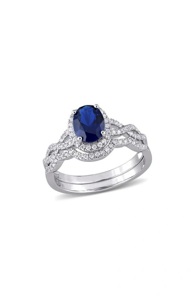 Delmar Sterling Silver Oval Cz Ring In Blue