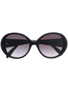 Alexander Mcqueen Sole Seal Logo Round Glasses In Nero