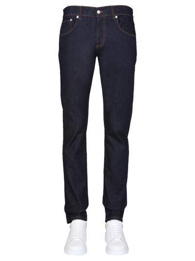 Alexander Mcqueen Jeans With Signature Logo Embroidered In Blue