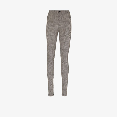Saint Laurent Black And White Check-patterned Skinny Trousers In Nero