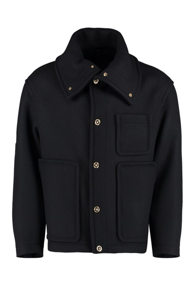 Versace Long Sleeved Buttoned Peacoat In Black