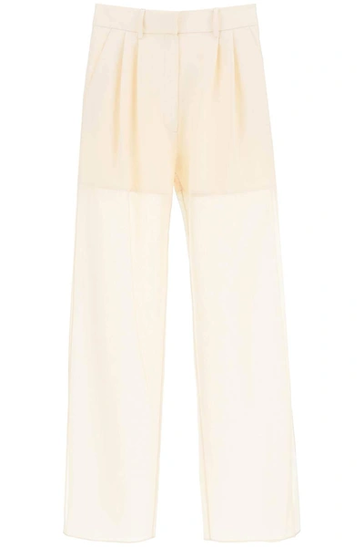 A.w.a.k.e. Trousers With Side Slits In Beige