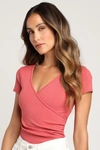 Lulus All Day Fave Rusty Rose Ribbed Surplice Short Sleeve Bodysuit In Pink