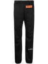Heron Preston Logo Patch Ruched-ankle Trousers In Schwarz