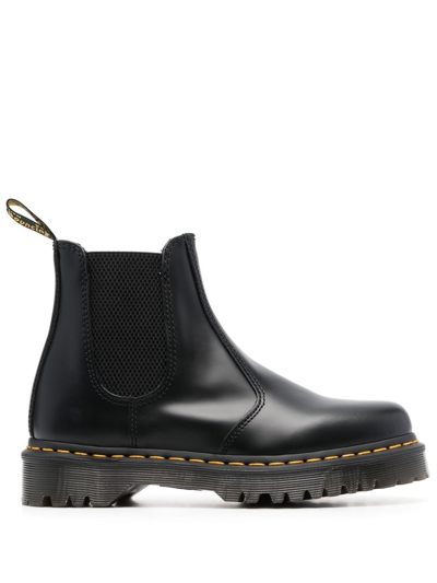 Dr. Martens' Leather Round-toe Boots In Schwarz