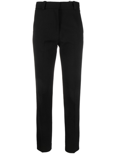 Khaite Amelie Crepe Slim-leg Trousers In Black