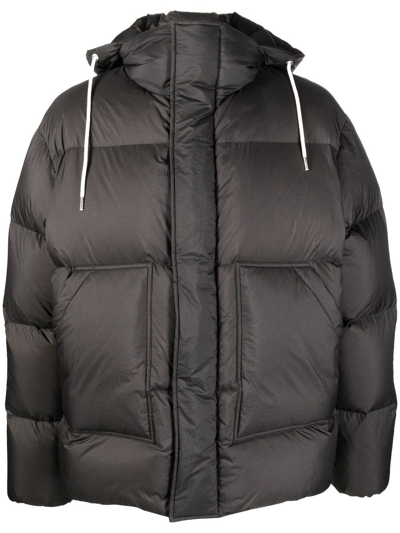 There Was One Hooded Puffer Jacket In Black