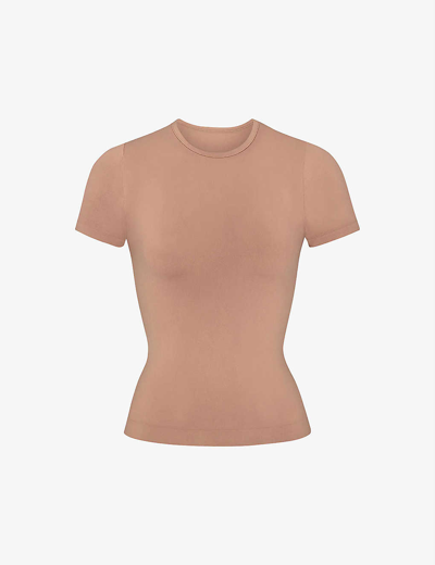 Skims Smoothing Slim-fit Stretch-woven T-shirt In Tan