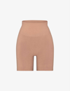 Skims Smoothing Mid-rise Stretch-woven Shorts In Sienna