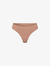 Skims Smoothing Mid-rise Stretch-woven Thong In Brown