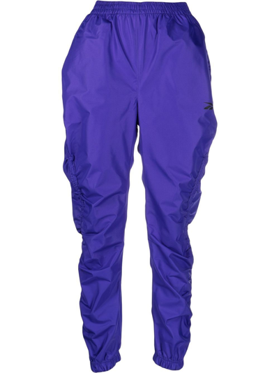 Reebok Cardi B High Waist Woven Pants In Ultima Purple