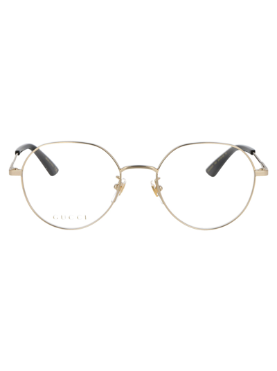 Gucci Oval Glasses In 002 Gold Gold Transparent
