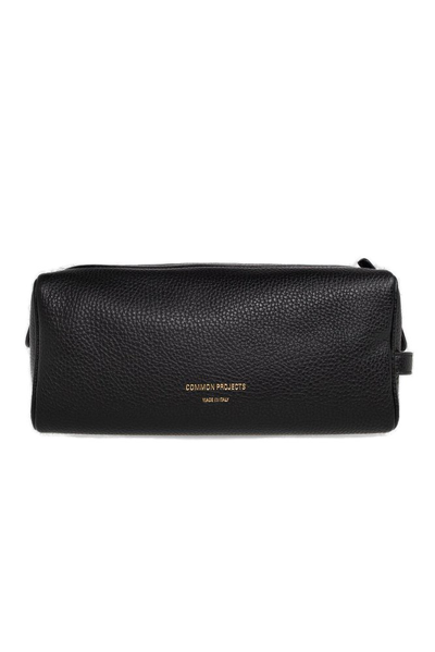 Common Projects Logo Embossed Zipped Wash Bag In Black