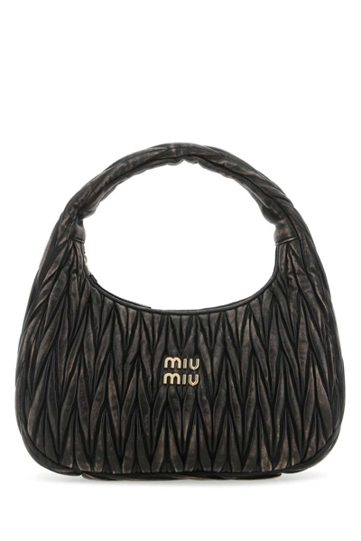 Miu Miu Logo Plaque Quilted Zipped Hobo Bag In Black