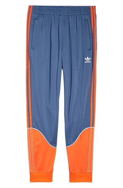 Blue orange adidas track pants 2025