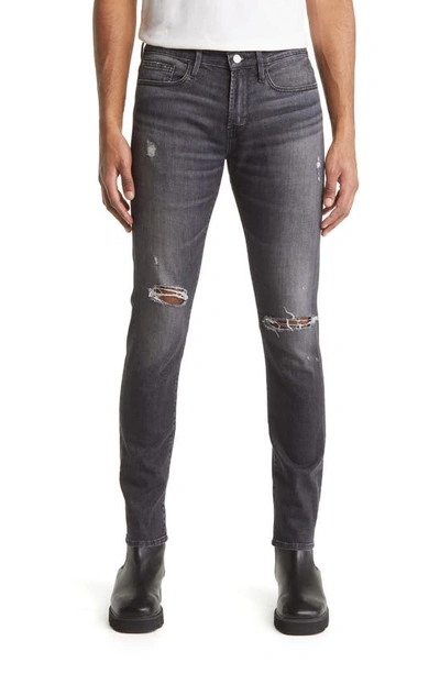 Frame L'homme Mid-rise Tapered-leg Stretch Organic Denim Jeans In Black Oak Rips