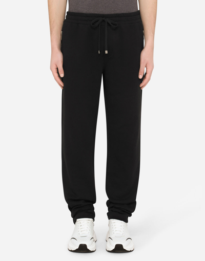 Dolce & Gabbana Rear Logo Patched Track Pants In Black