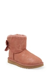 Ugg Mini Bailey Bow Glimmer Faux Fur Lined Boot In Sepia Film
