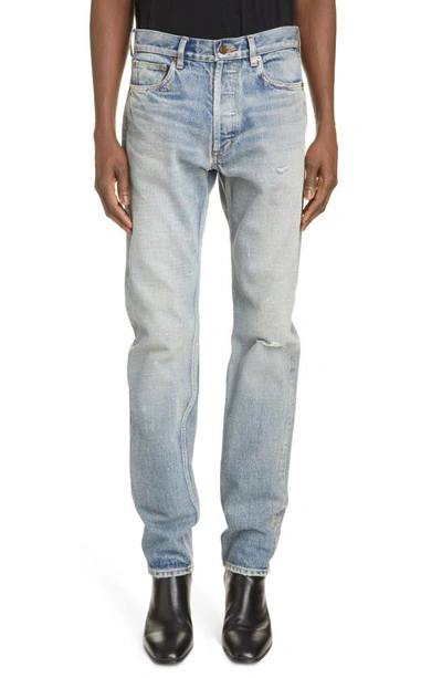 Saint Laurent Distressed Relaxed Fit Jeans In Melrose Blue