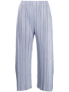Issey Miyake Plissé Cropped Tapered-leg Trousers In Blue