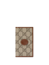 Gucci Gg Supreme-canvas Bi-fold Wallet In Brown
