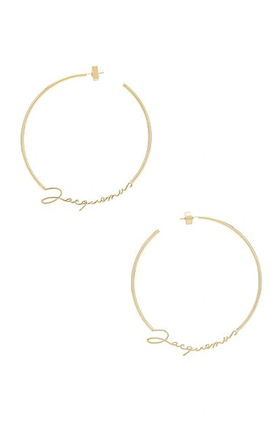 Jacquemus Gold-tone Logo Hoop Earrings In Golden