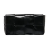Bottega Veneta Padded Tech Cassette Belt Bag In Black Silver