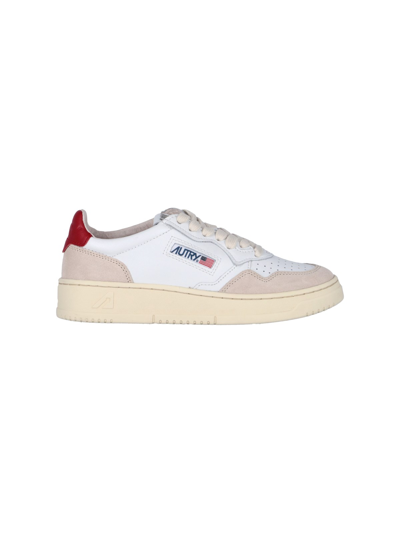 Autry Medalist Low Top Red Trim Leather Sneaker In White