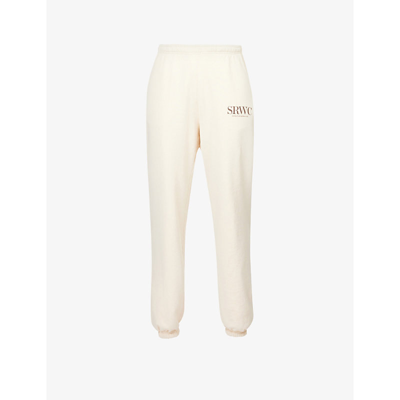 Sporty And Rich Upper East Side Logo-print Cotton-jersey Jogging Bottoms In Beige