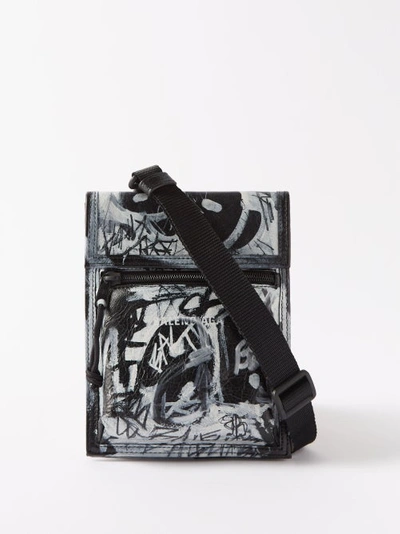 Balenciaga Explorer Graffiti-print Leather Pouch In Black