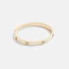 Coach Pegged Signature Hinged Bangle In Gold/chalk