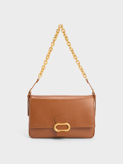 Charles & Keith Daki Belted Trapeze Bag In Chocolate
