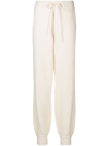 Remain Birger Christensen Tapered-leg Knitted Trousers In Neutrals
