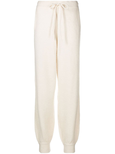 Remain Tapered-leg Knitted Trousers In Neutrals