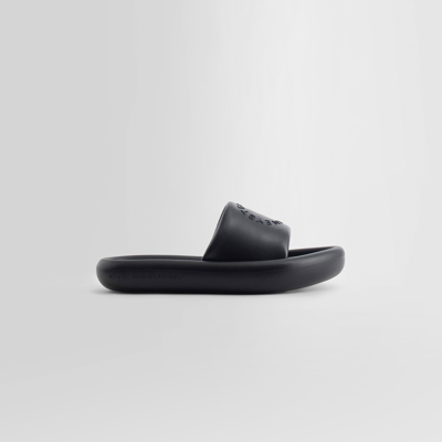 サンダル・ミュール STELLA MCCARTNEY Slippers and Clogs Women Eco Leather Black Stella Mccartney Slippers And Clogs Eco Leather In Black