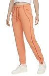 Nike Air Fleece Joggers In Orange/orange