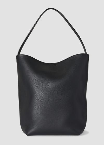 The Row Park Large North-south Tote Bag In Black