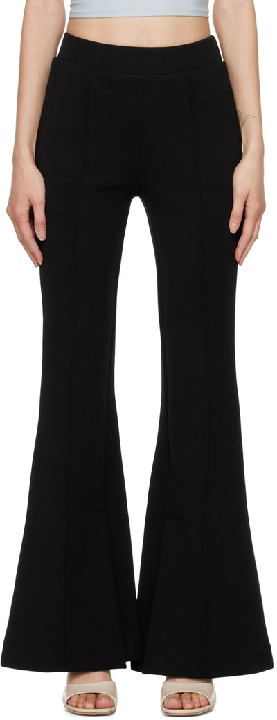 Frame Stretch-knit Flared Pants In Black