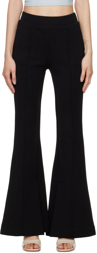 Frame Stretch-knit Flared Trousers In Black