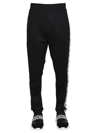 Moschino Jogging Pants With Adjustable Drawstring And Zippered Pockets In Black