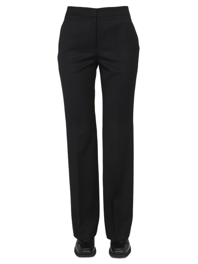 Moschino Wool Grain De Poudre Trousers In Black