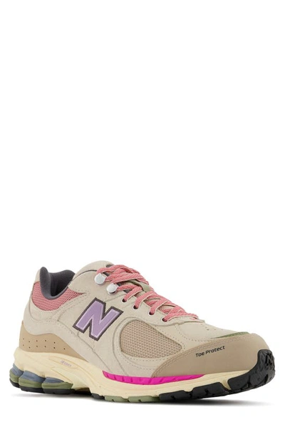 New Balance 2002r Sneaker In Calm Taupe/ Raw Amethyst
