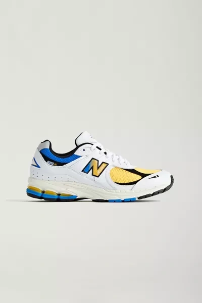 NEW BALANCE 2002R SNEAKER IN YELLOW, MEN'S AT URBAN OUTFITTERS