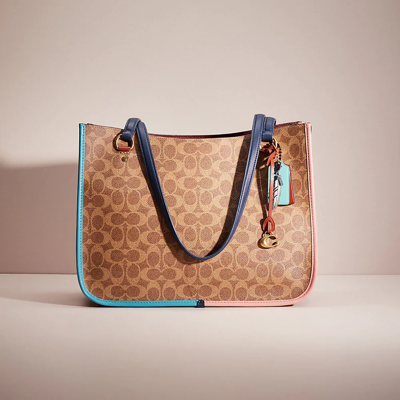 Coach Upcrafted Tyler Carryall In Signature Canvas In Brass/tan/rust ...