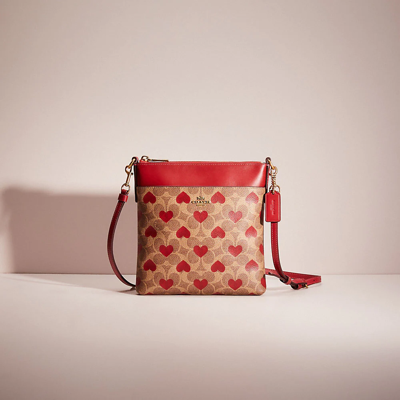 Coach Restored Kitt Messenger Crossbody In Signature Canvas With Heart Print In Brass/tan Red Apple