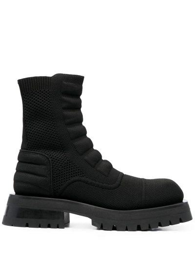 Balmain Knitted Combat Boots In Black