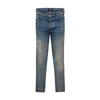 Amiri Distressed Logo Jeans In Clay Indigo