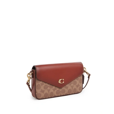 Coach Monogrammed Leather Clutch